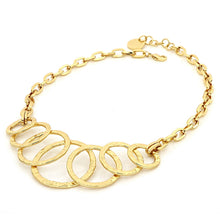 Carica l'immagine nel visualizzatore di Gallery, Collana girocollo semirigida con centrale a cerchi in bronzo placcato oro martellato unoaerre